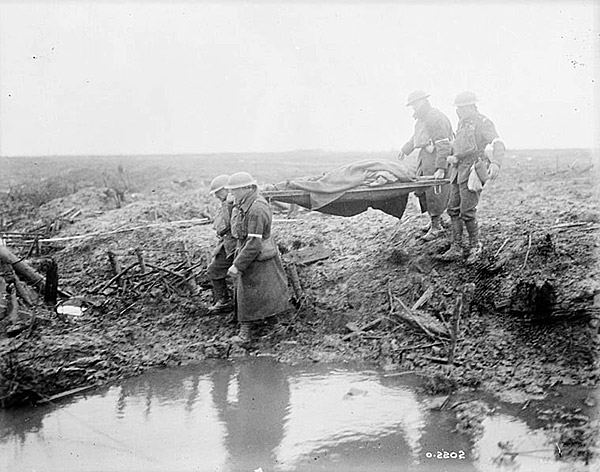 Evacuating a wounded Canadian soldier at the Battle of Passchendaele.