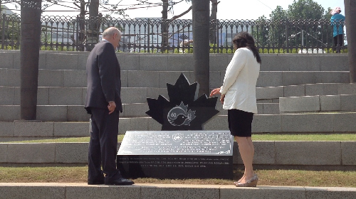 B-roll: Minister Fantino and Senator Martin at Monument in Seoul