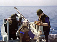 Équipe du canon du NCSM Protecteur, octobre 1990.