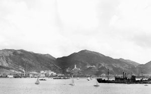 View of eastern Hong Kong from <abbr title='Her Majesty's Canadian Ships'>HMCS</abbr> <em>Prince Robert</em>, November 1941. <em>(Library and Archives Canada PA-114809)</em>