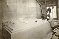 Sculptor sculpting the tomb for the Canadian National Vimy Memorial, France, 1935.