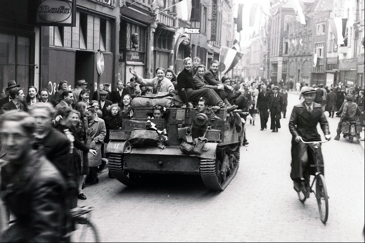 Dutch residents welcome Canadian soldiers after the liberation of the town of Zwolle on 14 April 1945