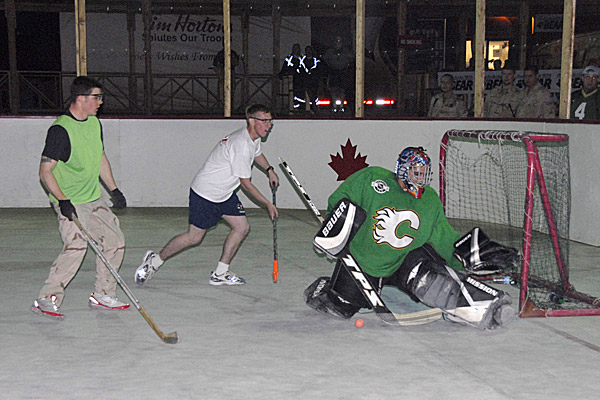 Playing ball hockey in Afghanistan.