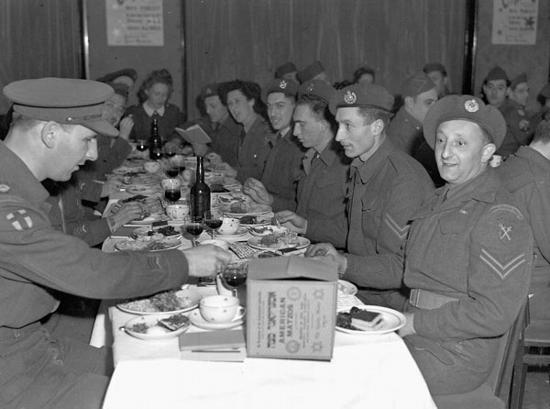 Canadian soldiers celebrating a Passover Seder meal