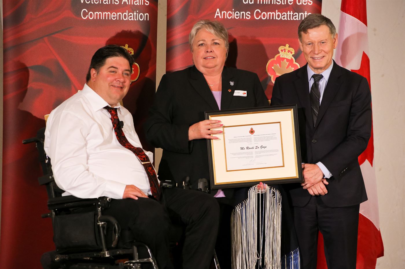 The honorable Kent Hehr, Minister for Veterans Affairs, Ms. Randi Gage and MP Terry Duguid.