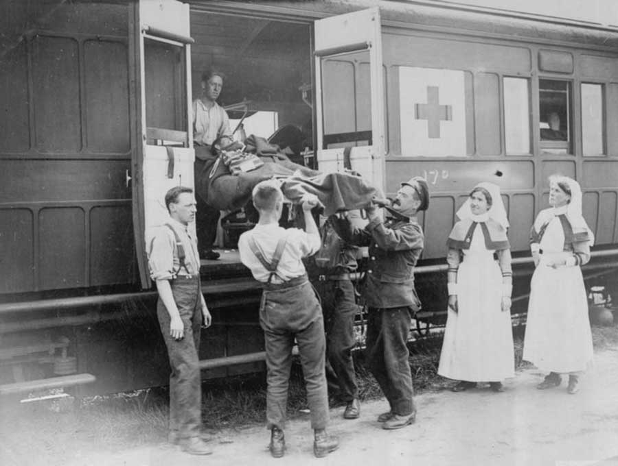A soldier wounded in the Battle of Hill 70 being evacuated to a Casualty Clearing Station.