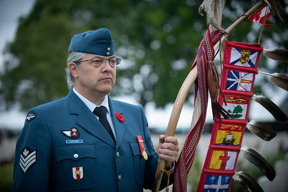 Eagle Staff bearer Sgt Ghislain Cotton during the 75th anniversary of D-Day and the Battle of Normandy, France (Photo: DND Image tech)