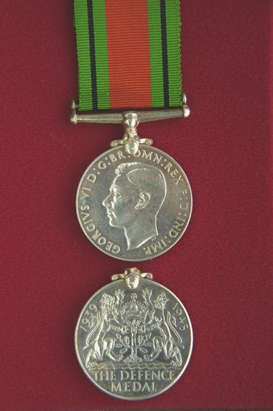 Defence Medal.  A circular, silver (.800 fine) medal, 1.42 inches in diameter.