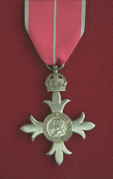 Member of the Order of the British Empire.  A silver badge (2 inches wide) no enamels).