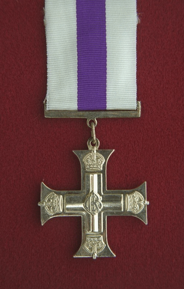 Military Cross.  A plain silver cross, 1.75 inches across.