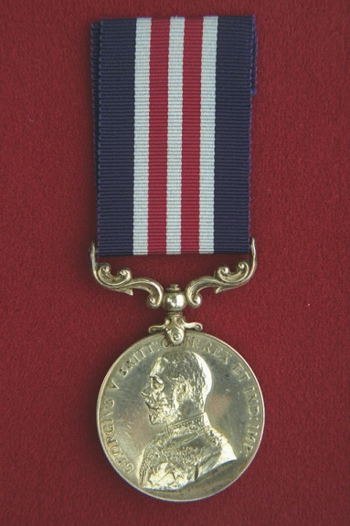 Military Medal.  A circular, silver medal, 1.42 inches in diameter.