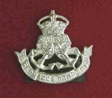 Navy Class A.  A silver coloured metal pin, 1 5/16 inches high and 1 3/8 inches wide.