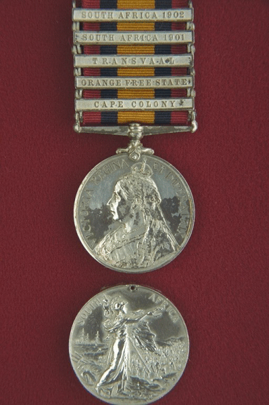 Queen's South Africa Medal. A circular, silver medal, 1.42 inches in diameter.