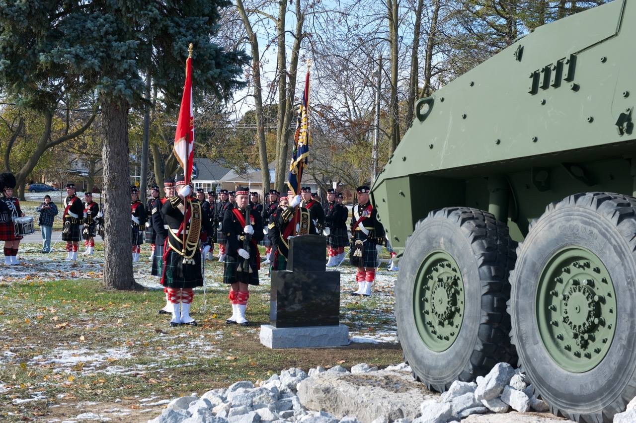 RHFC Colour Guard on front of Afghanistan Memorial LAV III