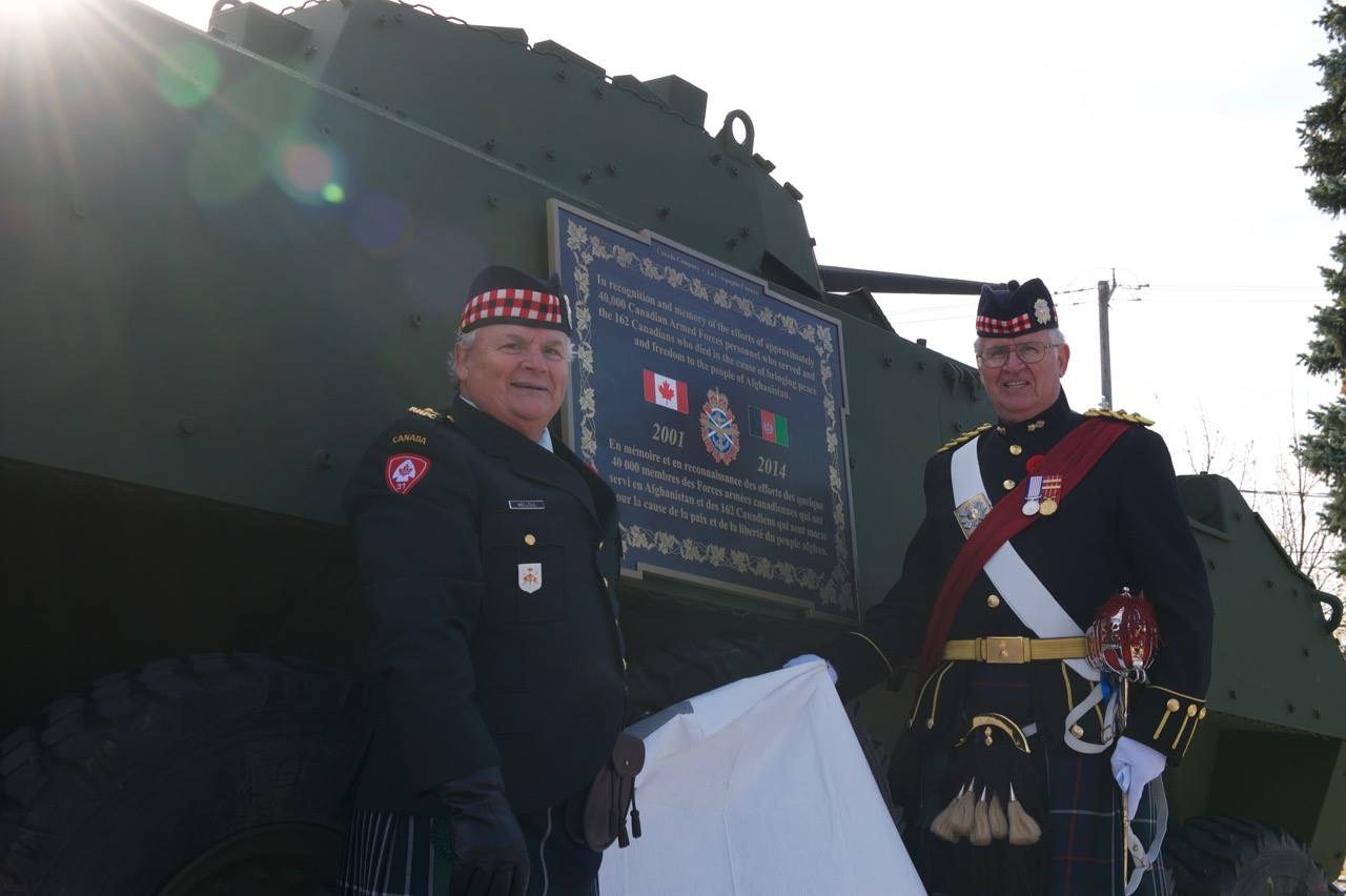 Left to right; HLCol Bernard Melloul and HCol Brian Rainville CD of the RHFC unveiling the commemorative plaque.