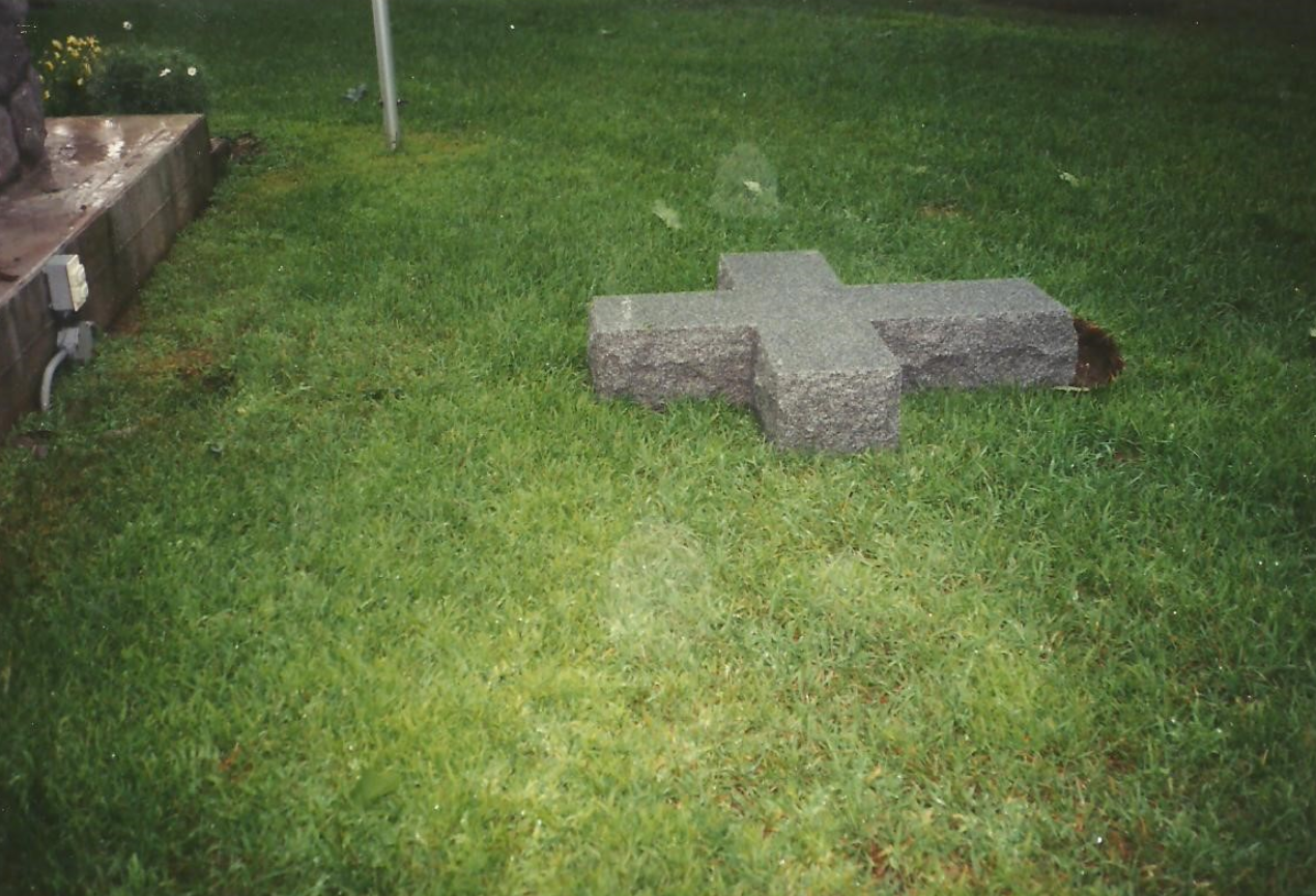 Damaged cross from a micro-burst in 1998.
