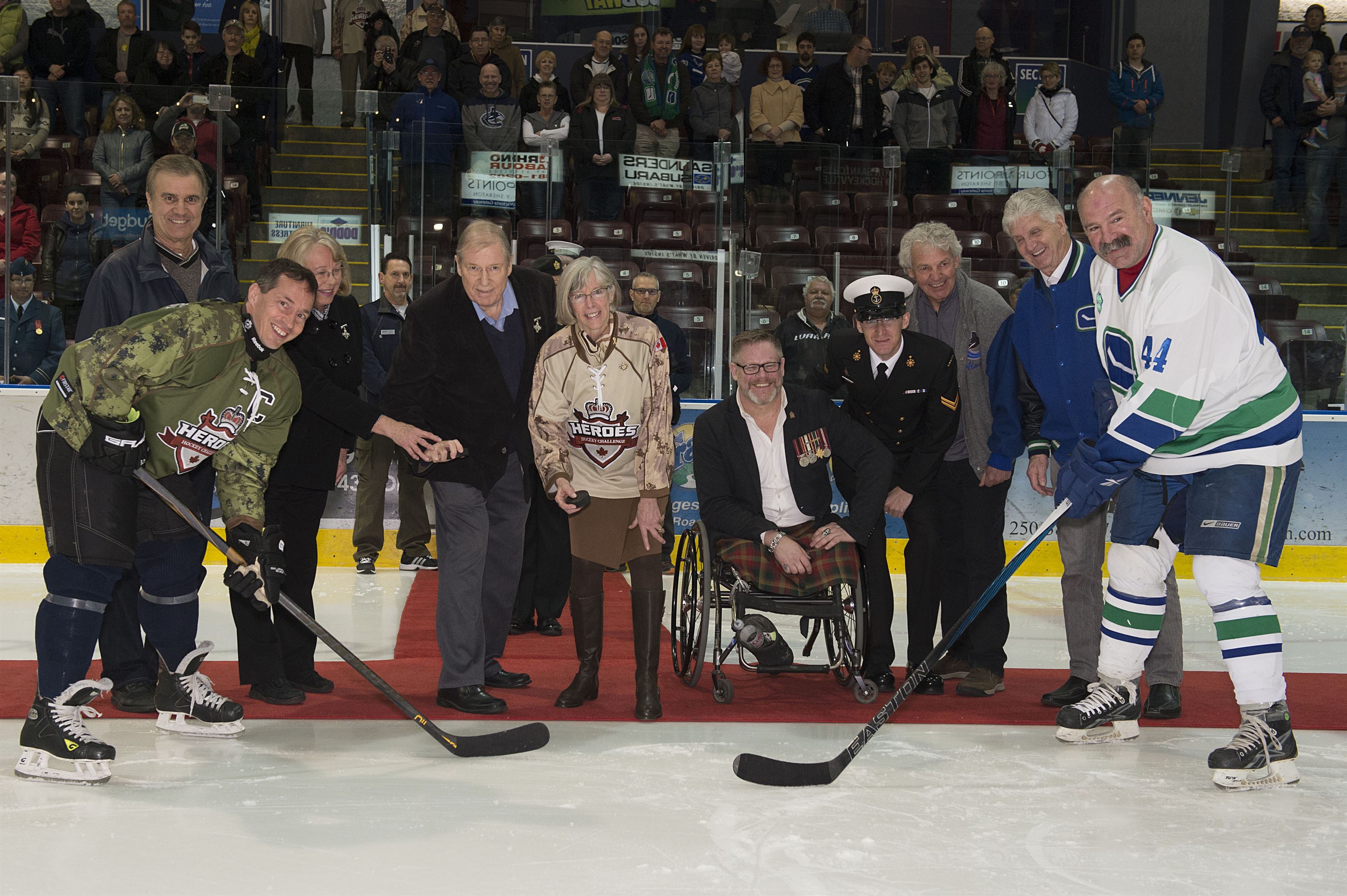 Puck drop at Vancouver Canucks Alumni and members of the Canadian Armed Forces game