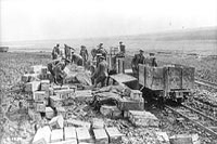 Loading up ammunition on to a light railway.