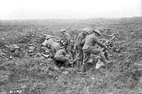 Canadian machine gunners dig themselves in in shell holes at Vimy Ridge, April 1917.