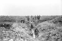 Canadians on guard over German dug-outs waiting for the enemy to surrender. Vimy Ridge, April 1917.