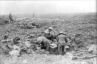 Canadian machine gunners dug in shell holes in Vimy advance, April 1917.