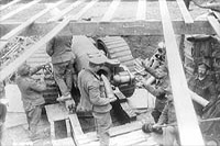 Loading a large naval gun on the Canadian front, during the Battle of Vimy Ridge.