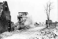 A shell exploding in the village of Vimy