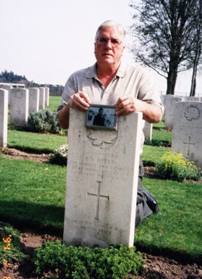 Dennis Isfeld visiting his father's grave