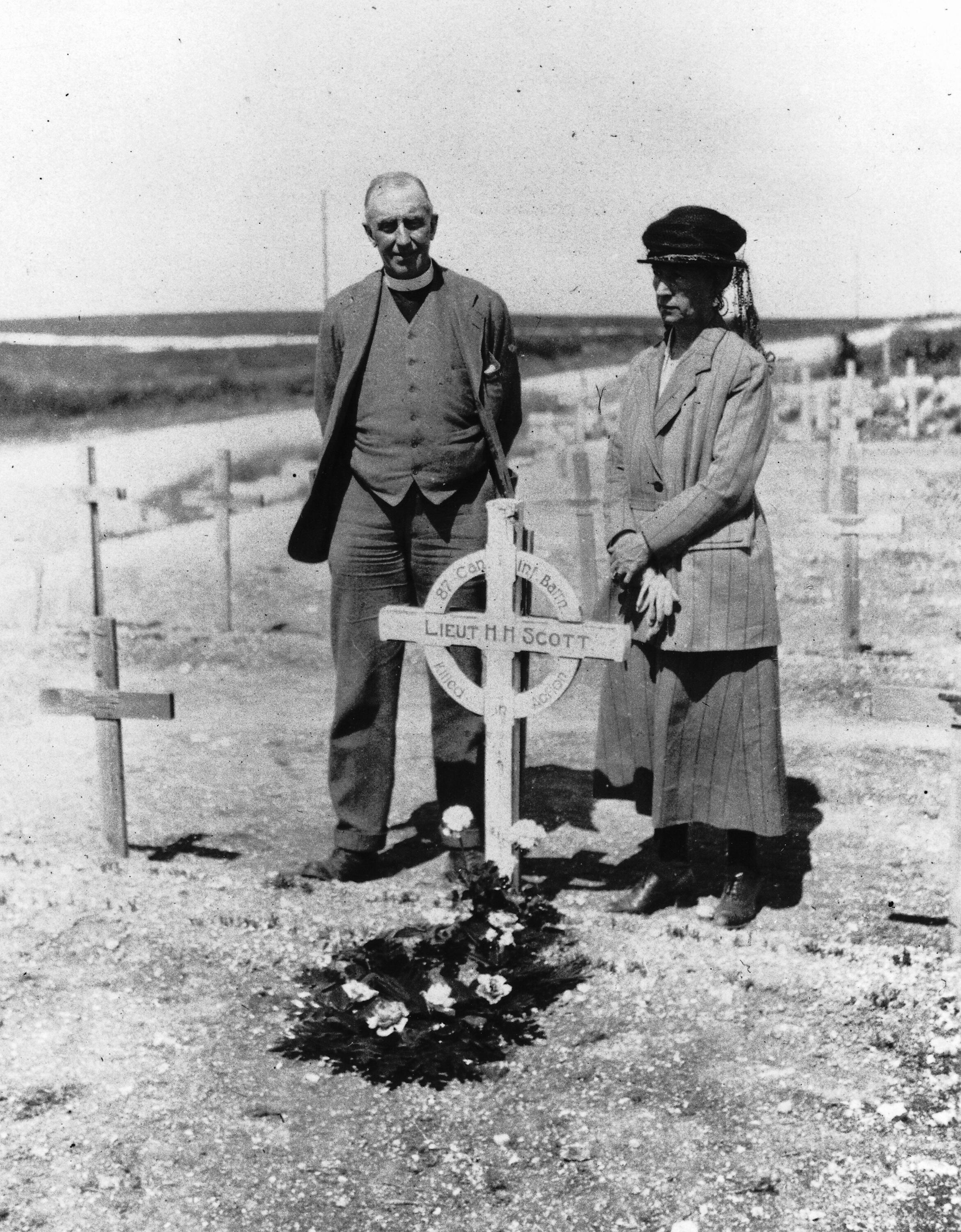 Parents visiting grave