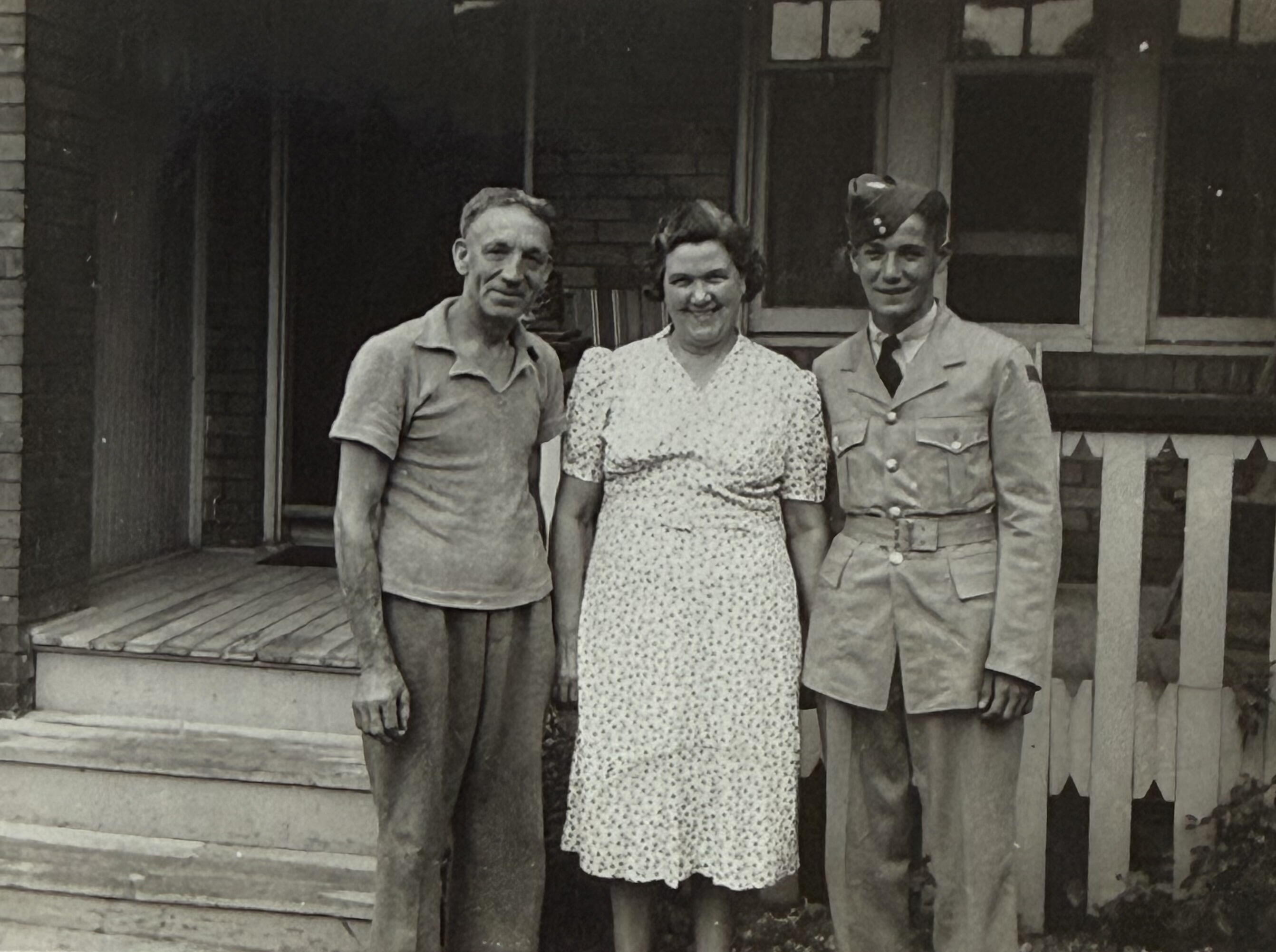 Pilot Officer Eric Joseph Fereday, Toronto, with his parents