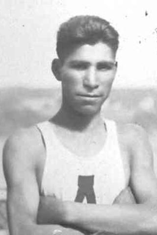 Barney Francis wearing a sleeveless jersey